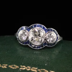 Antique Art Deco Platinum Old Mine Cut Diamond and Sapphire Three Stone Ring