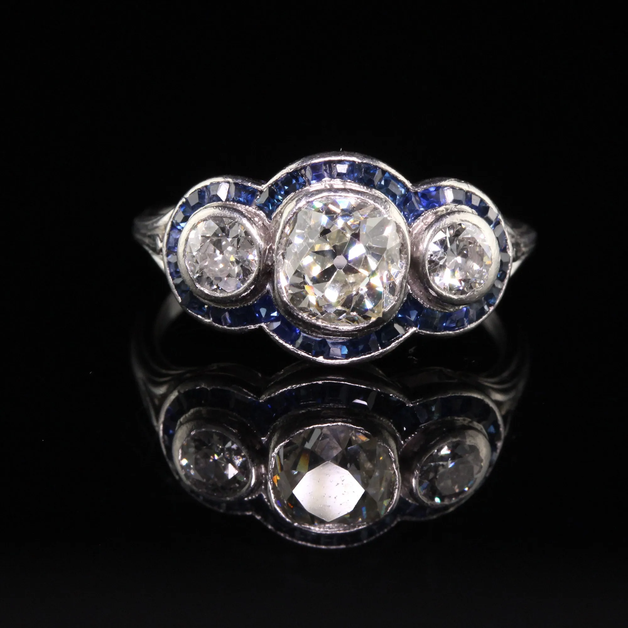 Antique Art Deco Platinum Old Mine Cut Diamond and Sapphire Three Stone Ring
