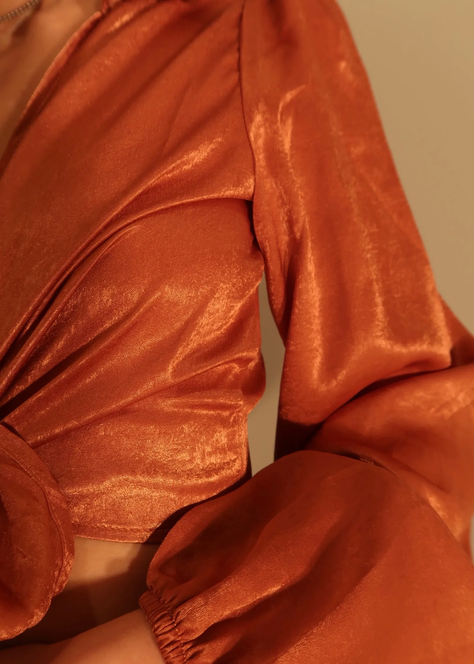 BURNT ORANGE SATIN LONG SLEEVE CROP TOP